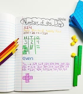 Number of the Day written on top of open notebook page with activities about the number 324