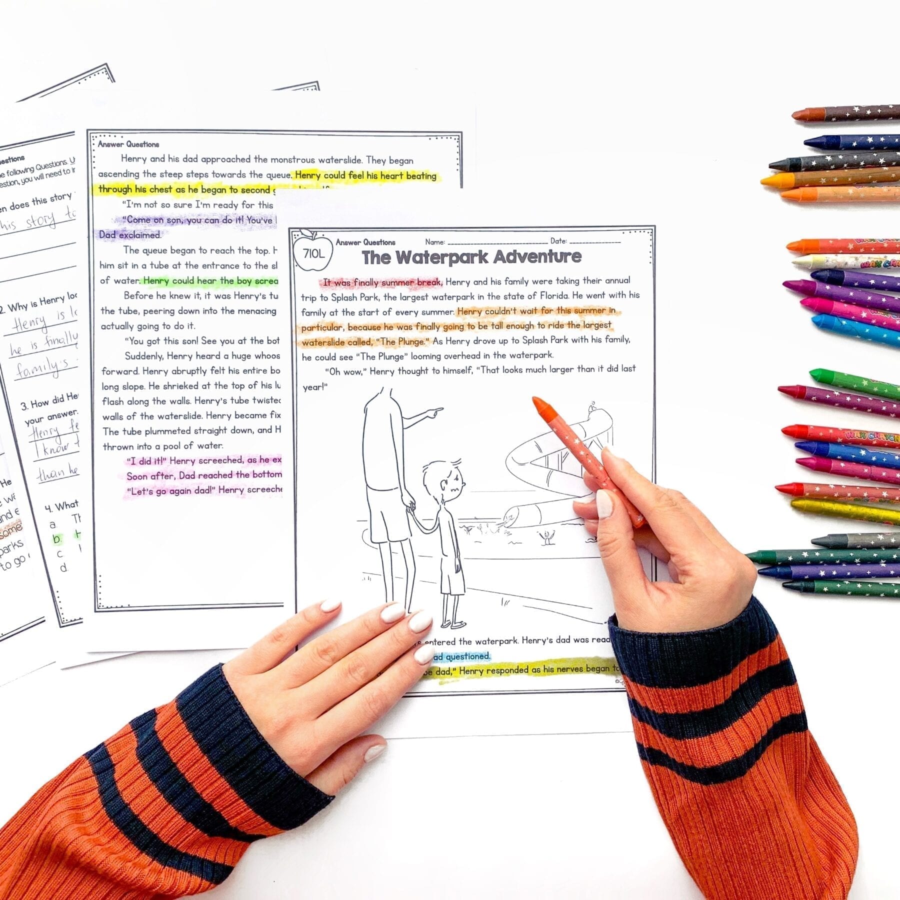 Close reading fiction passage titled The Waterpark Adventure and question page with a column of crayons on the right side of photo