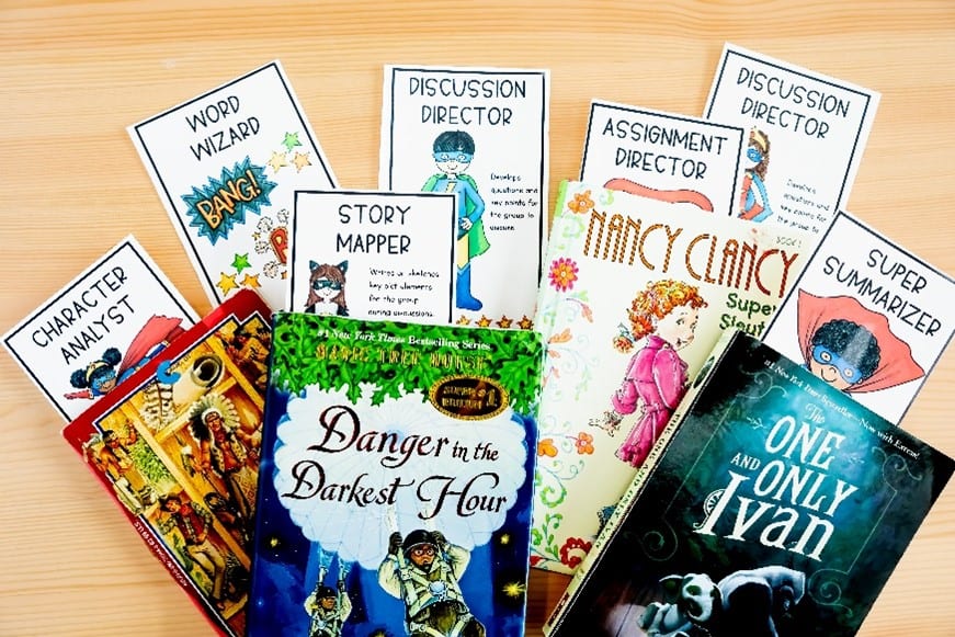 Picture of four chapter books and role playing bookmarks for use in implementing literature circles in elementary classrooms
