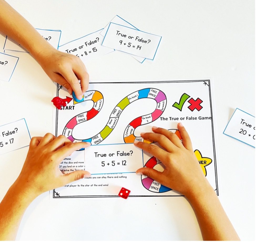 Students playing games reinforces the meaning of the equal sign.